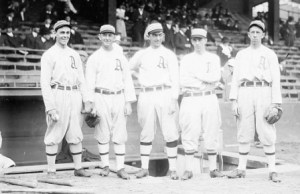 Frank Baker, center, Eddie Collins, far right,