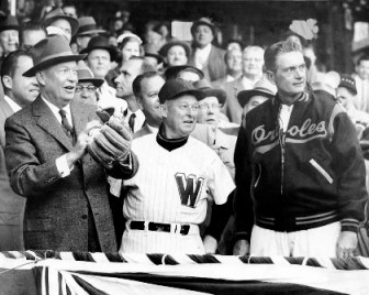 President Eisenhower at the 1957 American League opener in Washington--with Senator  Manager Chuch Dreesen and Baltimore Orioles Manager Paul Richards 
