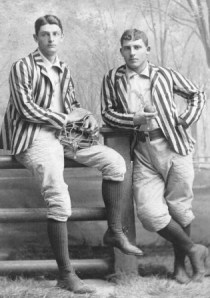 Amos Alonzo Stagg, right, with Yale catcher Jesse Dann