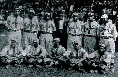 1910 Chicago Giants--Sitting, left to right, Nate Harris, George "Chappie" Johnson, Bill Pettus, "Smokey" Joe William, and Dick Wallace, standing, left to right, George Ball, Harry Moore, "Candy" Jim Taylor, Frank Leland, Bobby Winston, Joe Green, and Danger Talbert